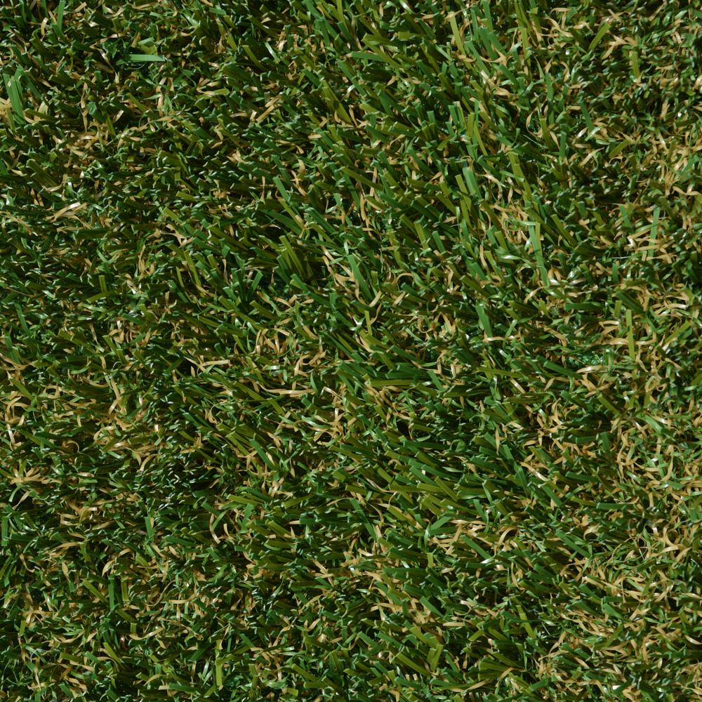 A close up image of artificial grass with green and brown A close up image of artificial grass with green and brown