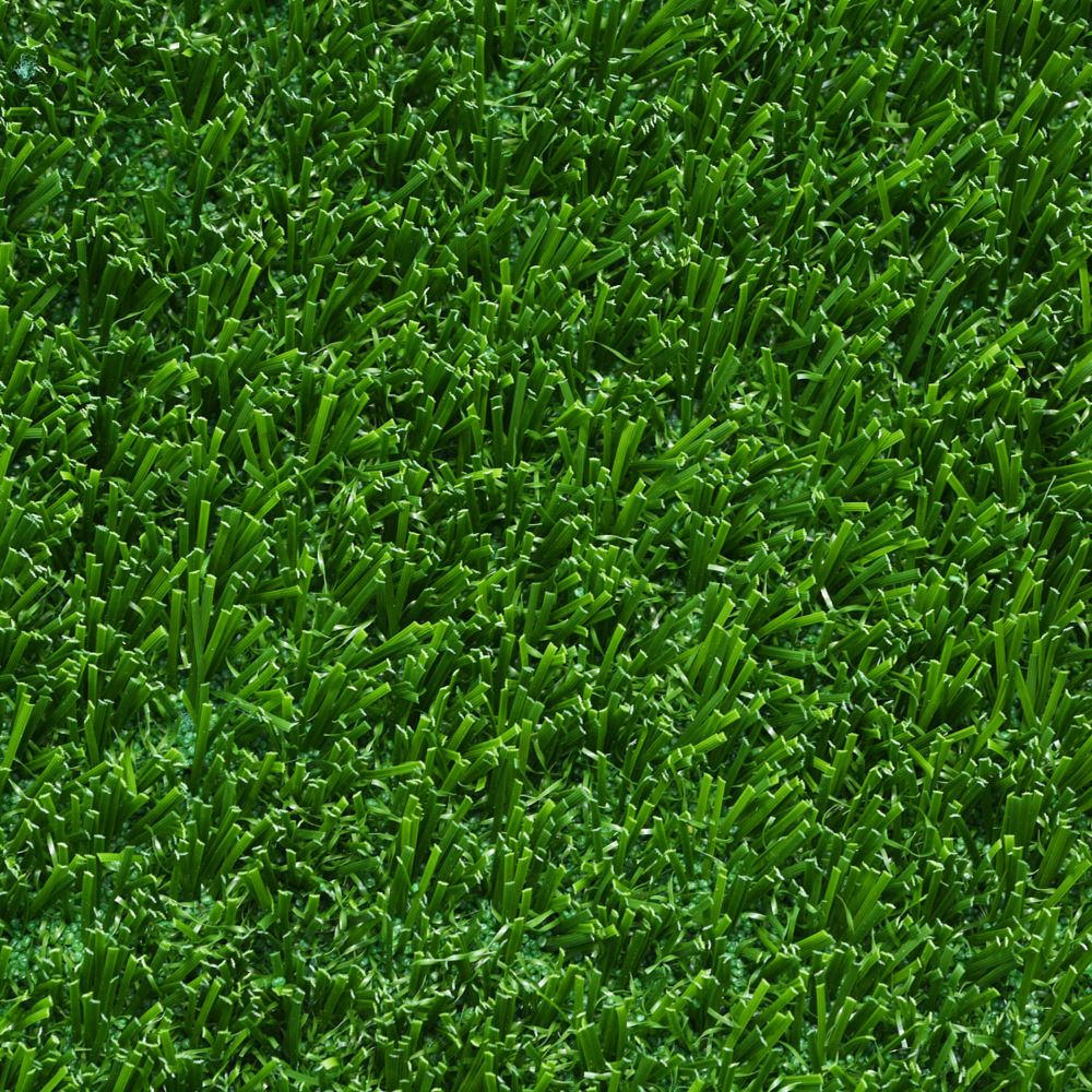 Close up image of artificial grass that is bright green. Close up image of artificial grass that is bright green.